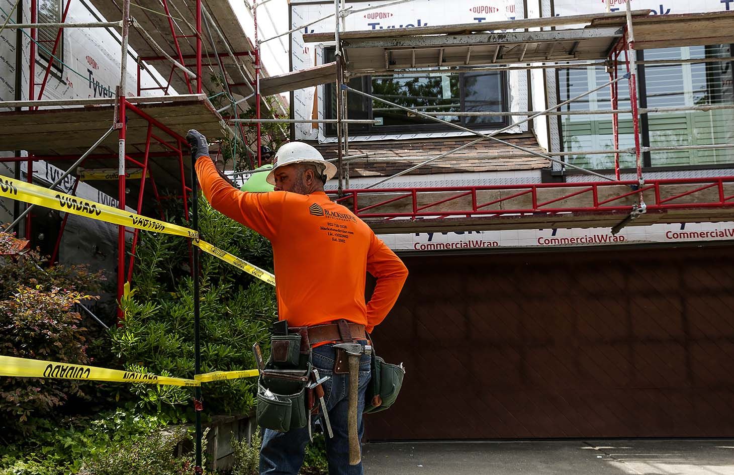 worker working on Summit ridge development exterior